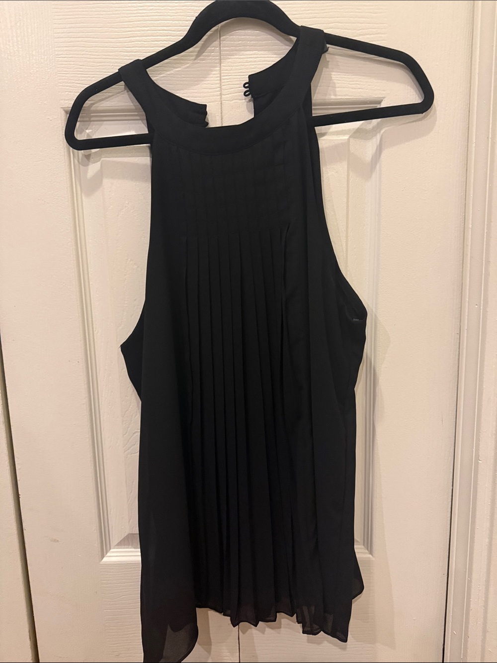 Sleeveless Black Pleated Halter Top no tags fits like a large.